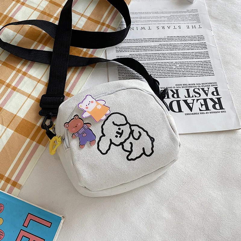 

Casual ladies one-shoulder canvas bag cute cartoon pattern solid color double pocket zipper new girl travel messenger small bag
