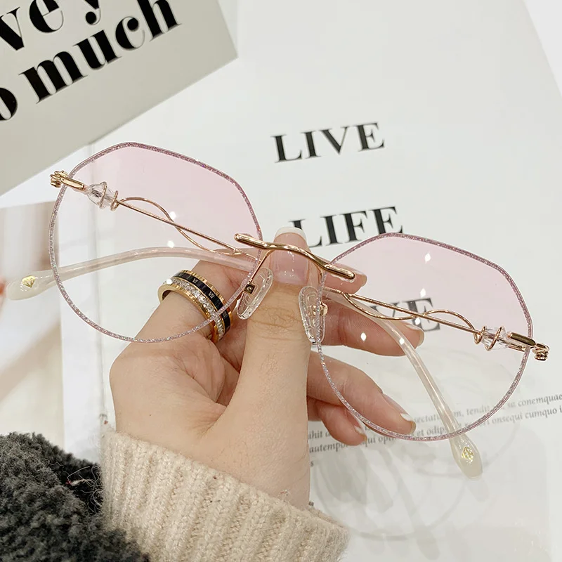 

New net Red Sunglasses trend glasses rimless cut edge Flashing Sunglasses Women's Metal Sunglasses