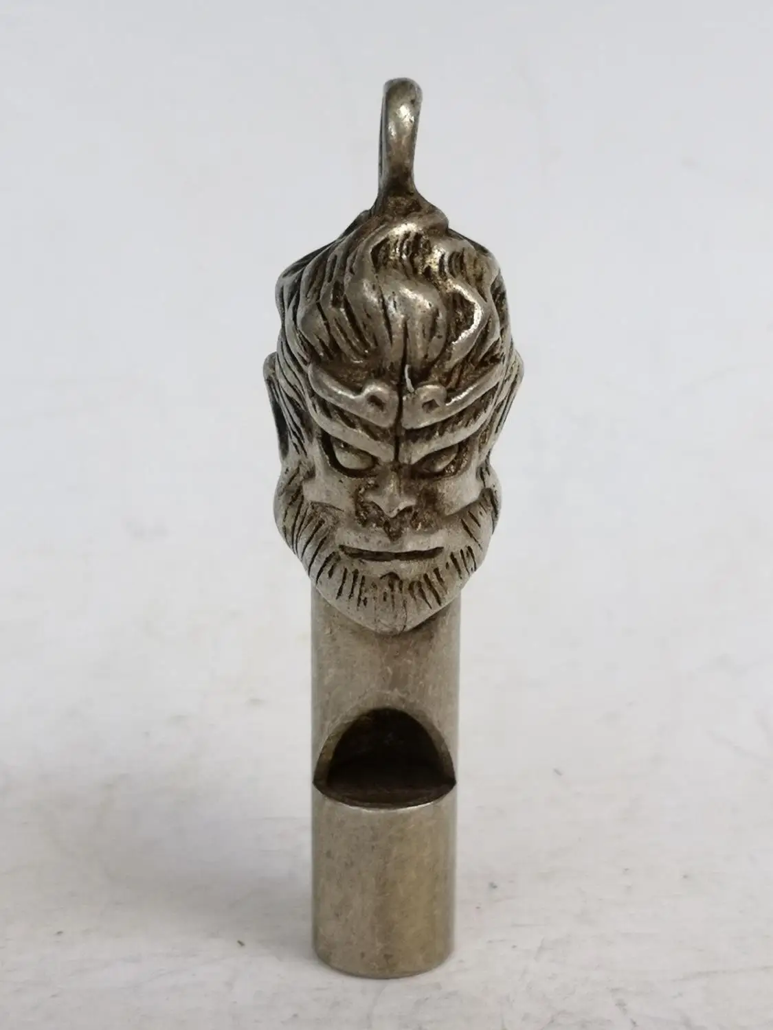 

YIZHU CULTUER ART Old Collection China Tibet Silver Carving Sun Wukong Head Portrait Whistle Pendant self-rescuer Wonderful Gift