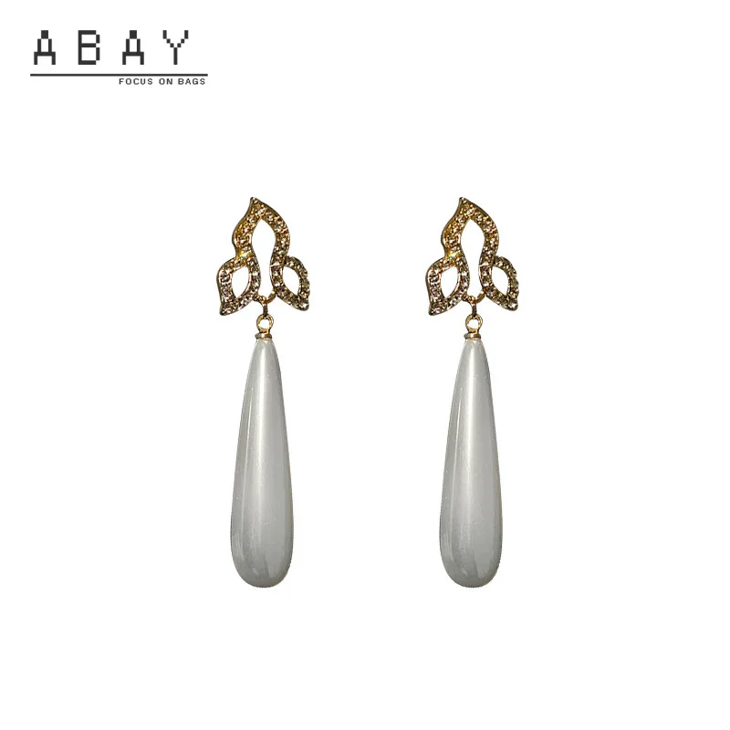 

925 Silver Needle Pearl Long Irregular Flashing Rhinestone Leaf Earrings New Matte Metal Retro Geometric Design Sense Fashion
