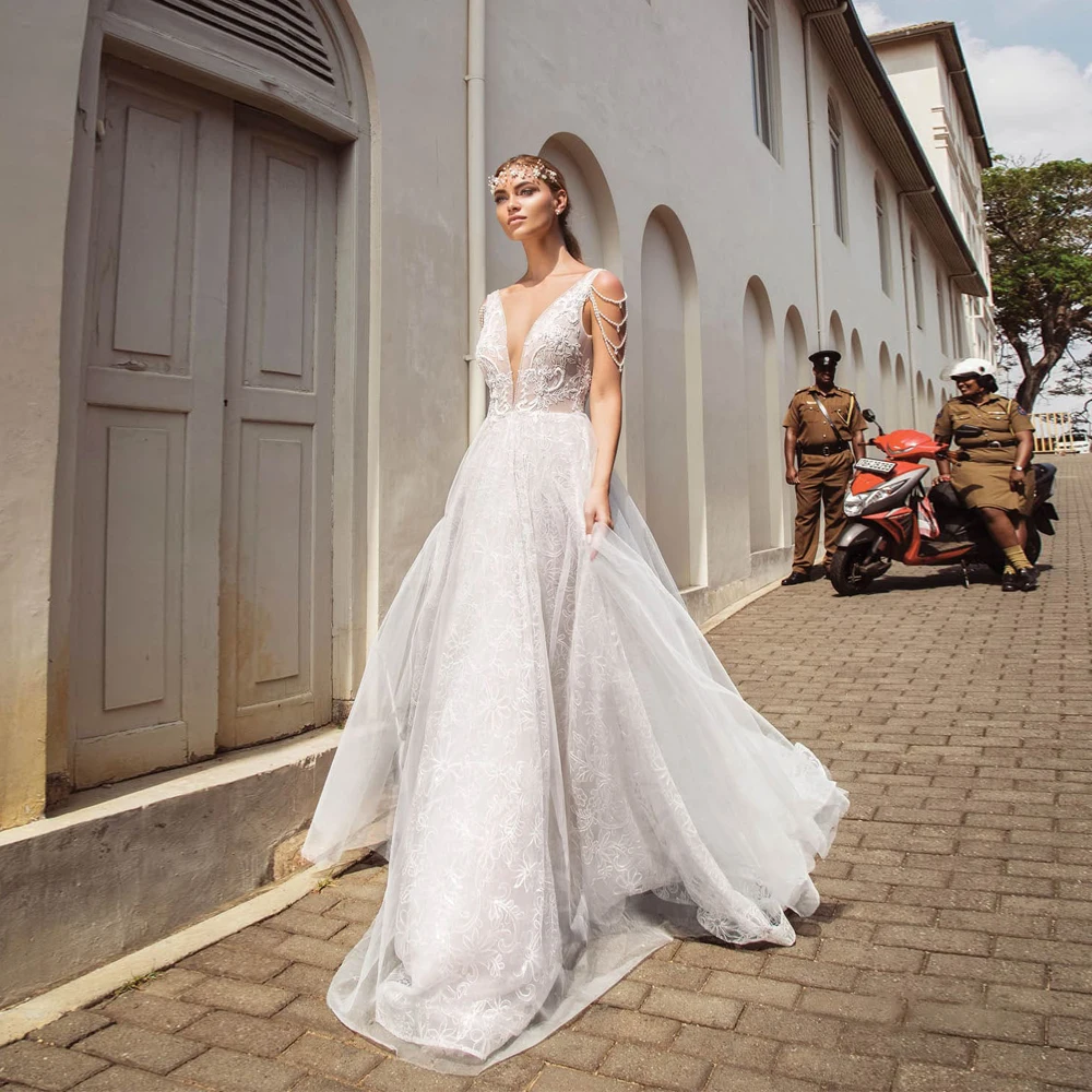 

Vestidos Elegant Wedding Dresses Lace Beading V-Neck Sleeveless Backless Ball Sweep Train Bridal Gowns