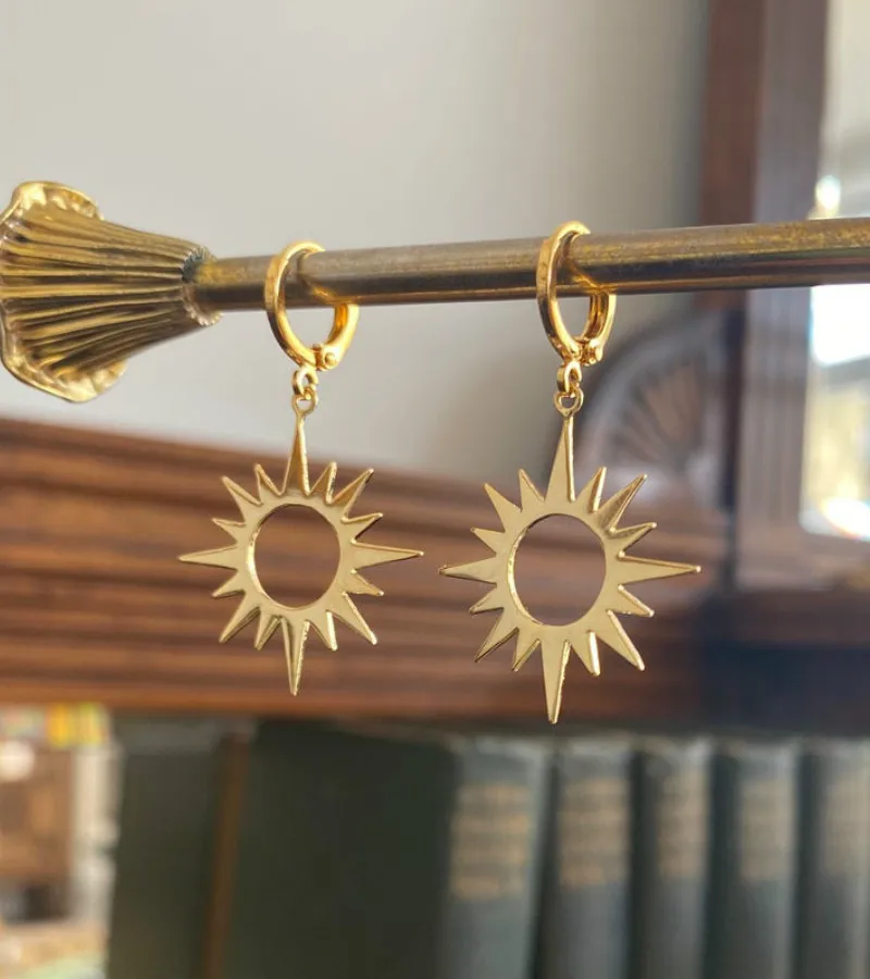 

Large Gold Sun Huggie Hoop Earrings