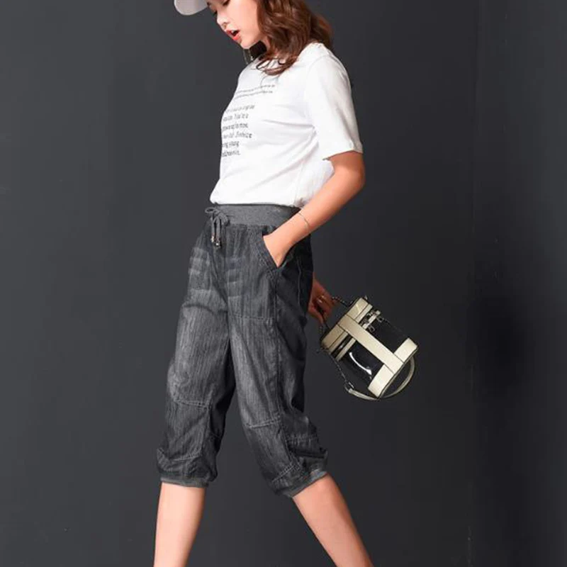 Размера плюс черные джинсы женские летние штаны шаровары брюки светильник мыть