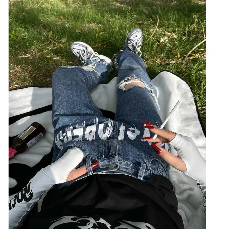 

Blue print big hole jeans women's 2021 new design sense versatile fried Street high waist wide leg winter pants autumn women