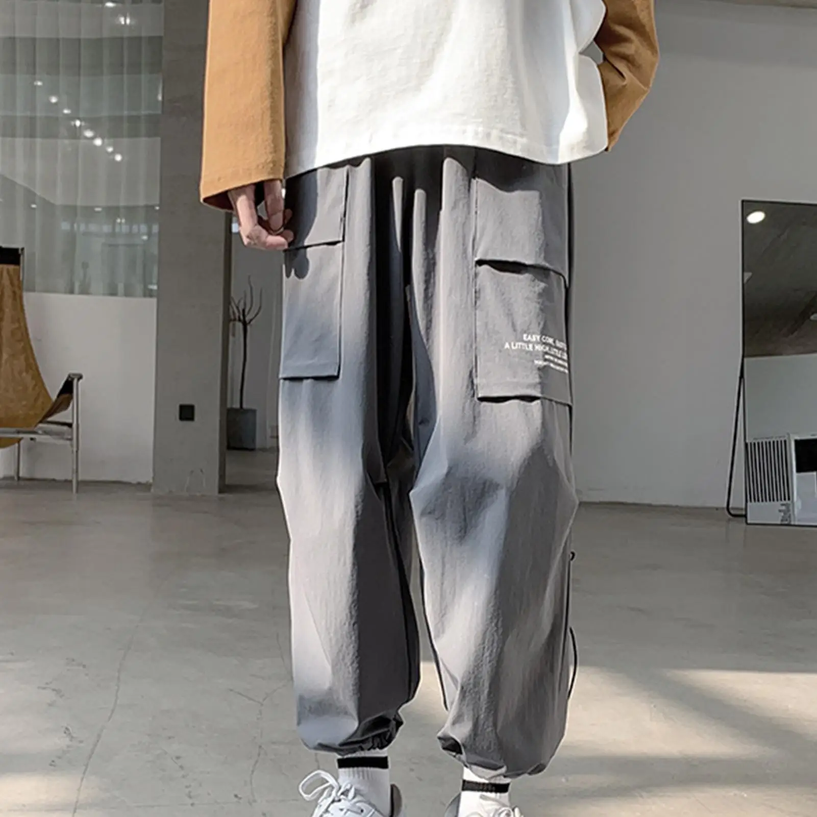 

High Quality Men Sporty Thin Sweatpants Multi Pockets Ankle Tied Long Pants Loose Trousers Casual Harem Sweatpants Trousers