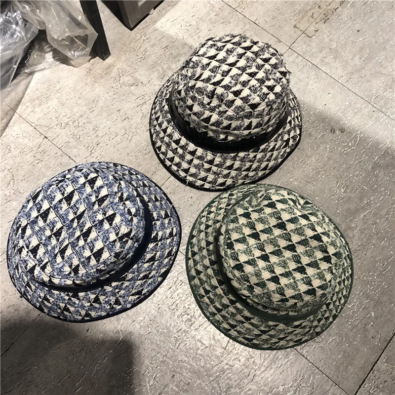 

Autumn and winter new hat female European and American retro grid fisherman hat Japanese wool basin hat
