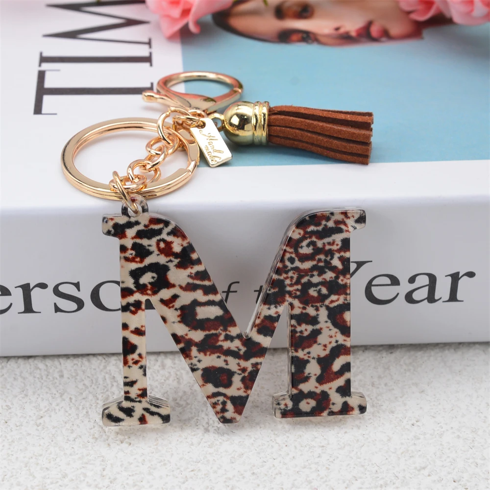 

Новинка, брелок с леопардовым рисунком из смолы, 26 дюймов, брелок с кисточкой и английским алфавитом для женщин, брелок для ключей, подвески, ...