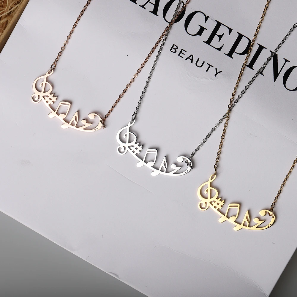 Нержавеющая сталь цвета: золотистый Декор из музыкальных нот ВЧ и кулон с