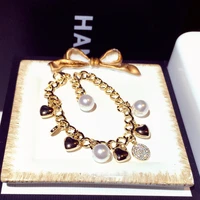 new gold luxury imitation pearl aaa zircon cute pendant love charm bracelets for women jewelry wedding prom birthday gift s00320