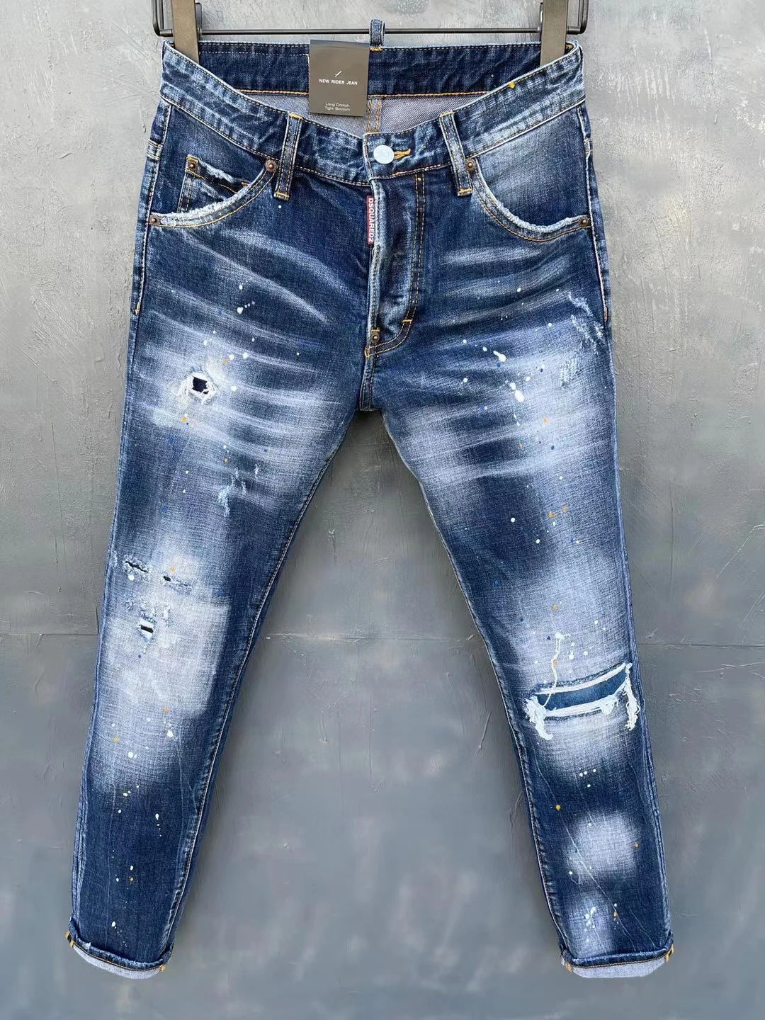 

2021 New Sstyle DSQUARED2 Ffashion Trend Locomotive Ripped Paint Jeans 037#