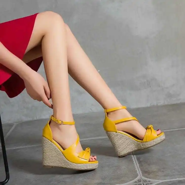 

2021 slope heel sandals women's summer new Korean versatile straw thick bottom waterproof platform Roman high heel sandals