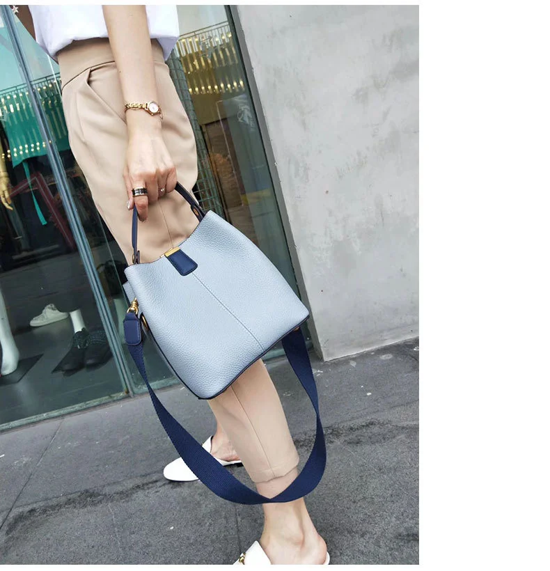 

Women's bag 2021 new leather Korean color contrast bucket bag head leather portable one shoulder bag