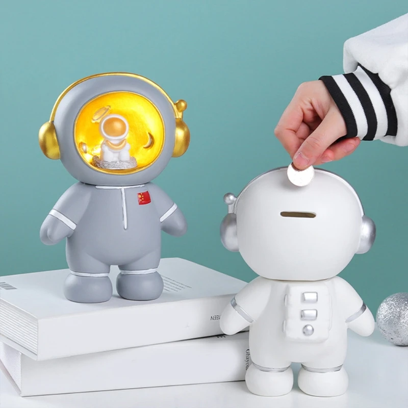 

Креативная Копилка-астронавт, Детская копилка для монет, коробка для сбора монет, статуя космического человека из смолы, настольный ночсвет...