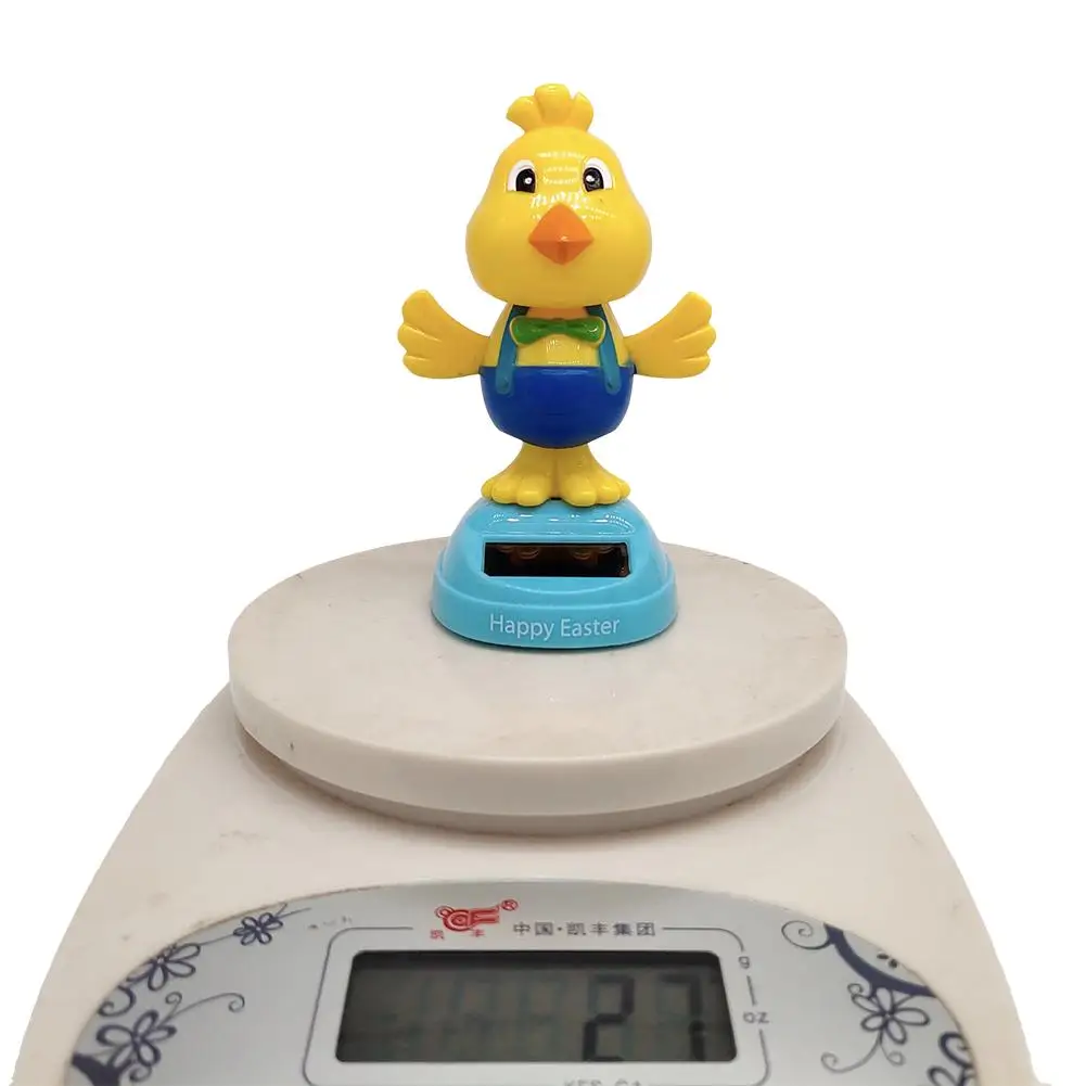 Кукла на солнечной батарее с виброголовкой раскачивающаяся курица