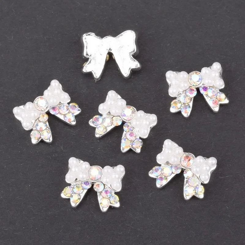 10pcs Strass 3d Nail Bow Tie AB White Rhinestone Pearl Design Nail Art Decoration Glamour Silver Alloy Jewelry Nail QB028-029