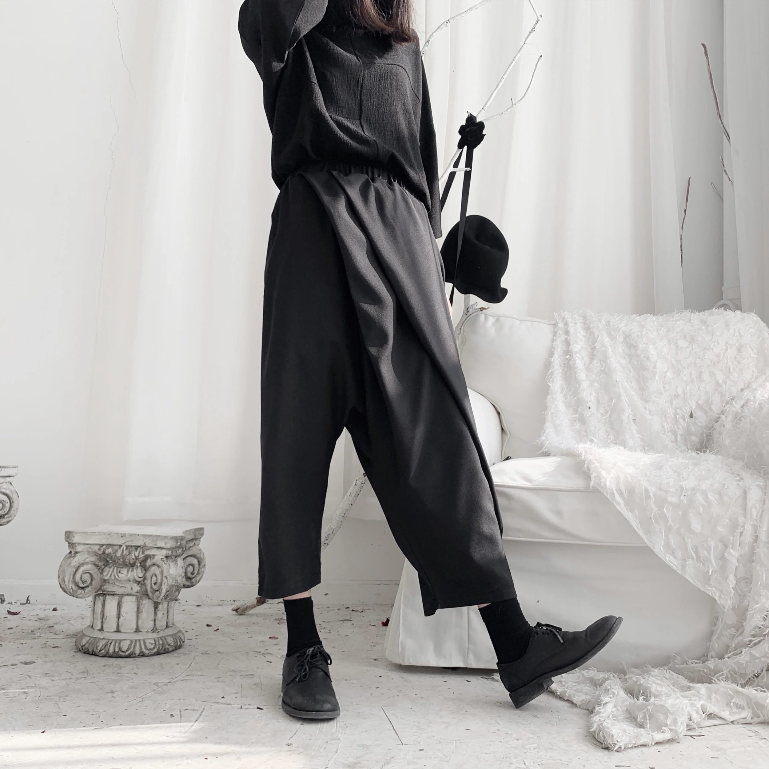 Dark Yamamoto Haute couture with irregular pleated Harem pants and slacks