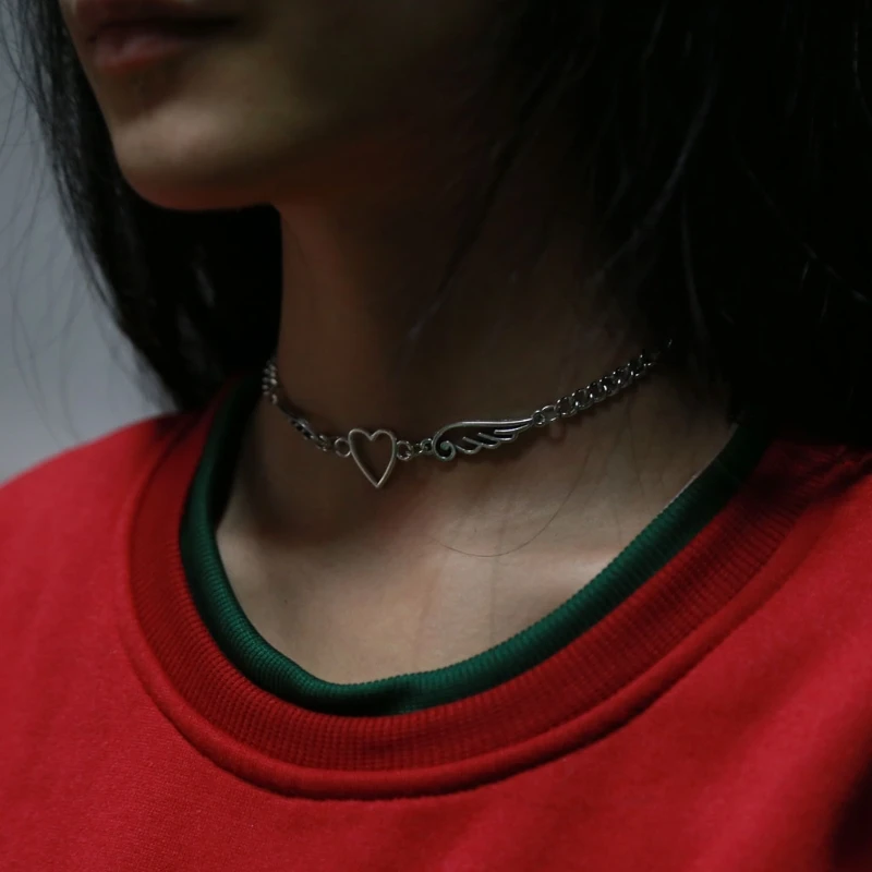 

Punk Hollow Out Heart Feather Metal Choker Necklace Women Girl Harajuku Angel Feather Pendant Necklace Fashion Jewelry