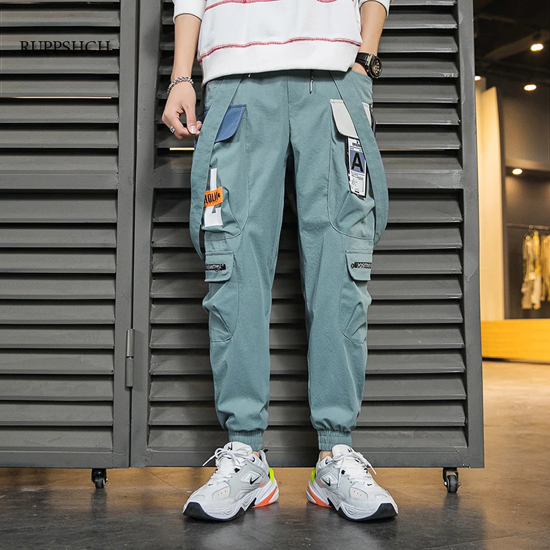 

Jogging casual sports trousers men hip-hop streetwear fashion tie feet Cargo pants ribbon printing men pants