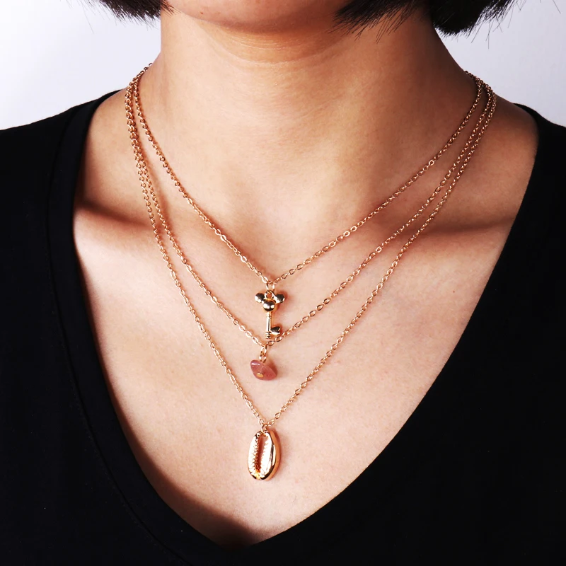 Простое стильное многослойное ювелирное изделие на цепочке до ключиц звёзды