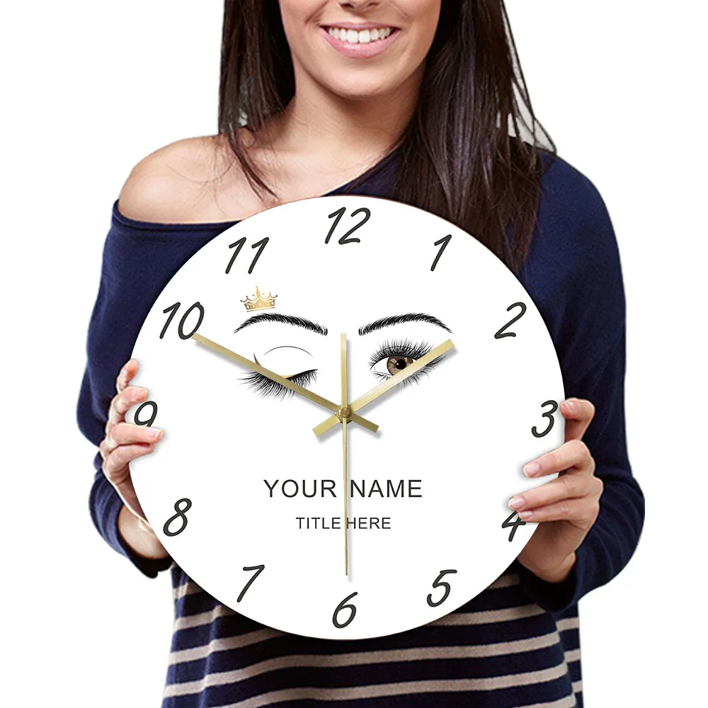 

Eyelashes Beauty Salon Studio With Custom Name Wall Clock Lashes Care Wink Eye Crown Eyebrows Makeup Art Personalized Watch