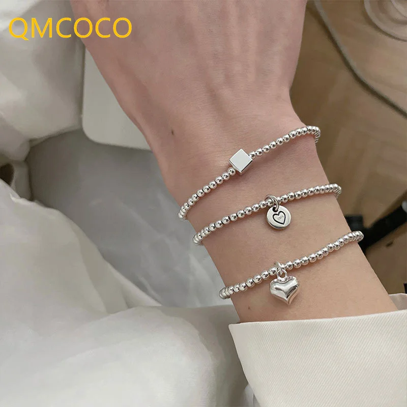 

QMCOCO Fashion Silver Color String Bead Bracelets Cute Smiley Love Heart-Shape Chain Woman Fine Accessories Trendy Party Jewelry