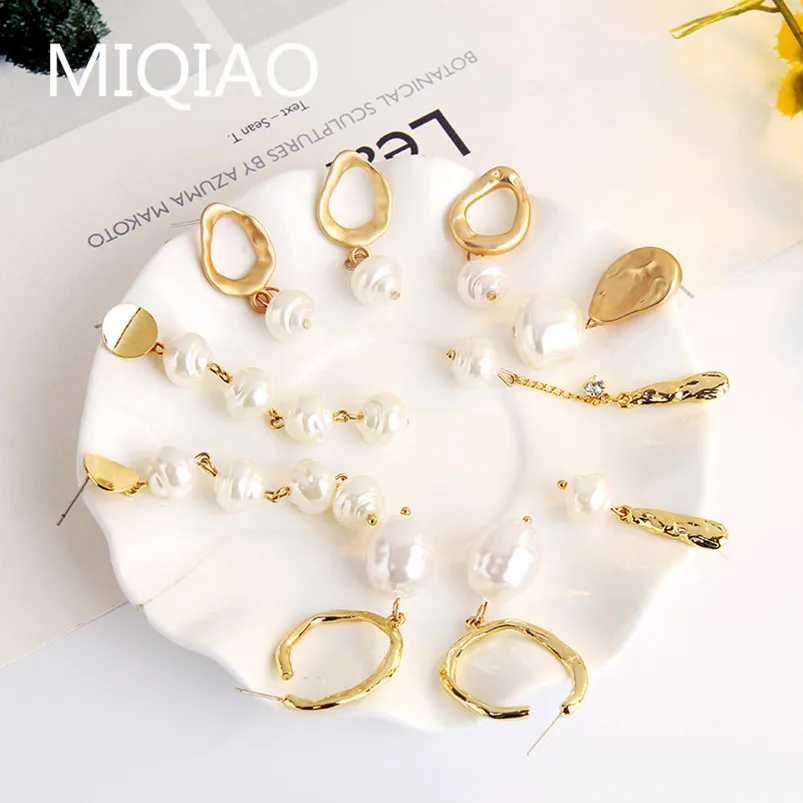 

Earring set new imitation natural pearl earrings female Earrings long Baroque zircon Pearl Earrings flower earrings