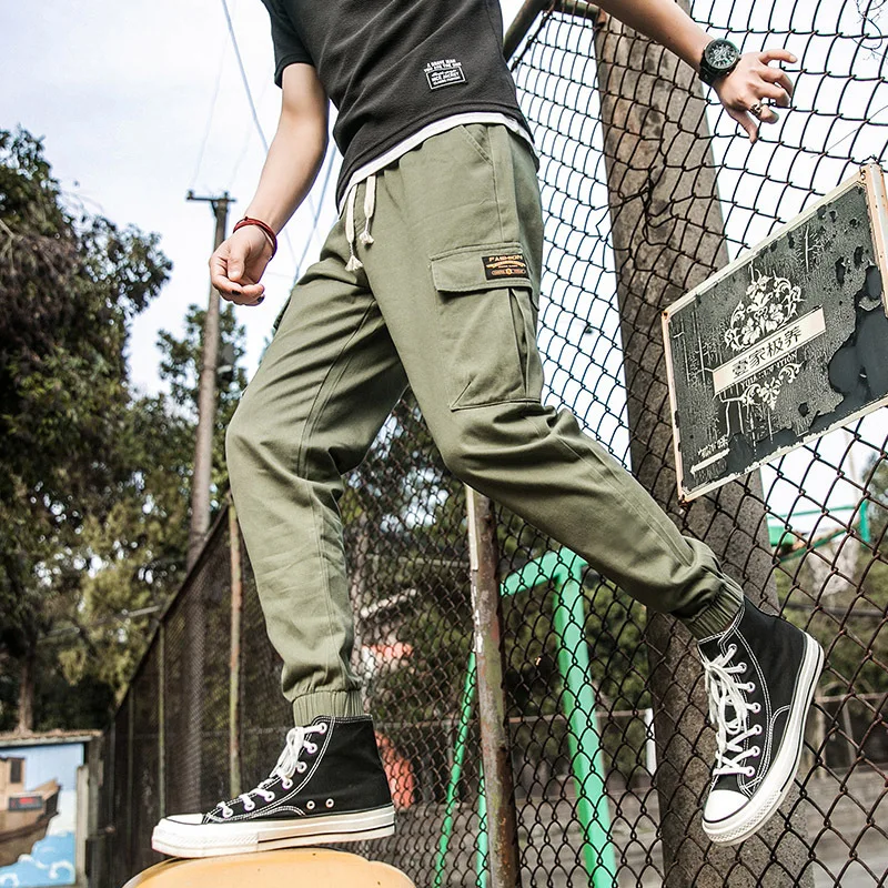 Мужские брюки карго с карманами фиолетовые ребристые тактические надписью для