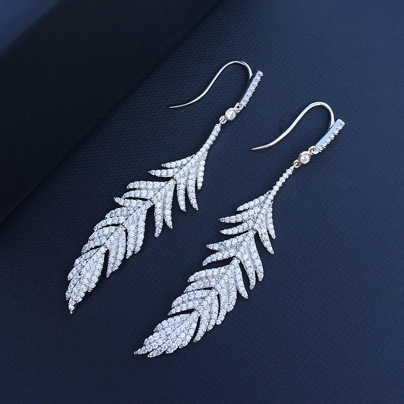 

popzone s925 sterling silver new feather earrings female French mysterious black light luxury fashion style feather ear hooks
