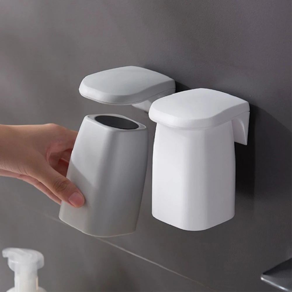 

Toothbrush Holder Plastic Magnetic Suction Wall Mounted Mouthwash Cup Holder Household Drain Shelf For Bathroom