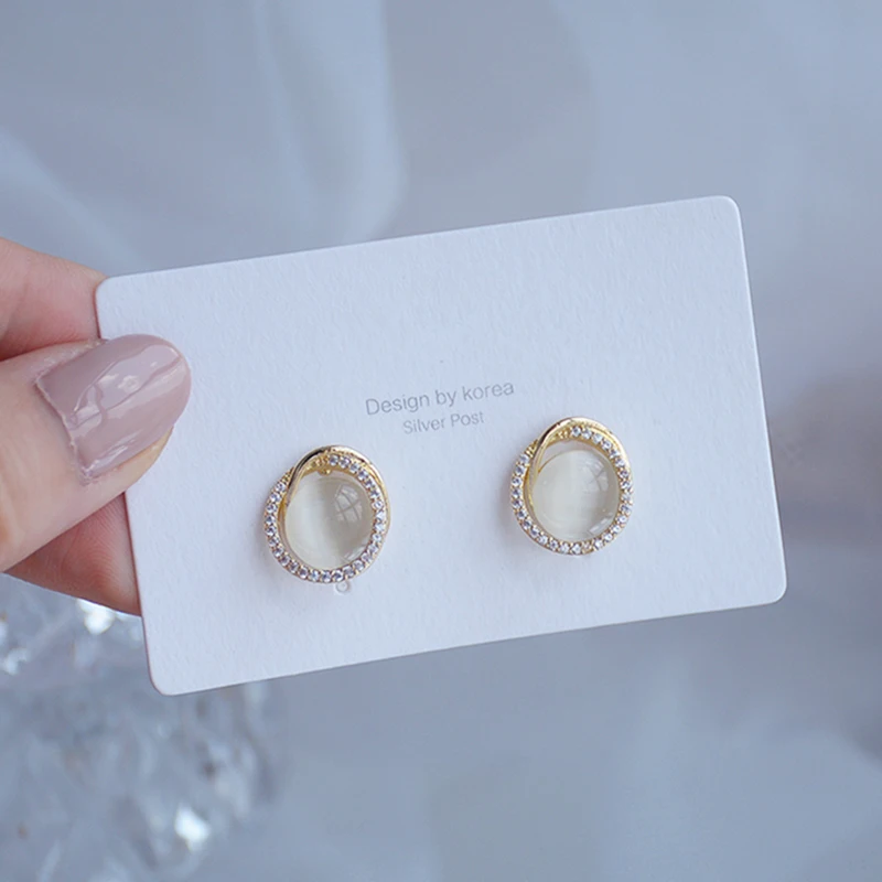 

S925 Needle Advanced Cat's Eye Stone Stud Earrings for Women Creative Design Luxury Jewelry Micro-inlaid High Quality Zircon