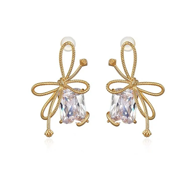 

Origin Summer Temperament Bow-knot Dangle Earring for Women Gold Silver Color Rhinestones Hollow Out Earring Jewelry Pendientes