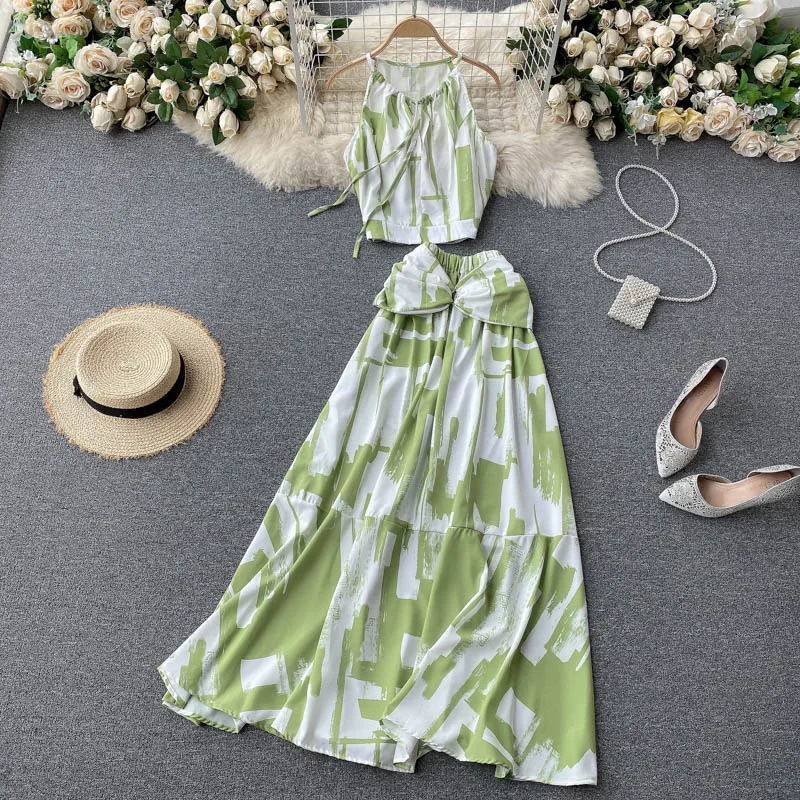 

Goddess holiday style suit 2021 new female design sense irregular color matching camisole high waist skirt