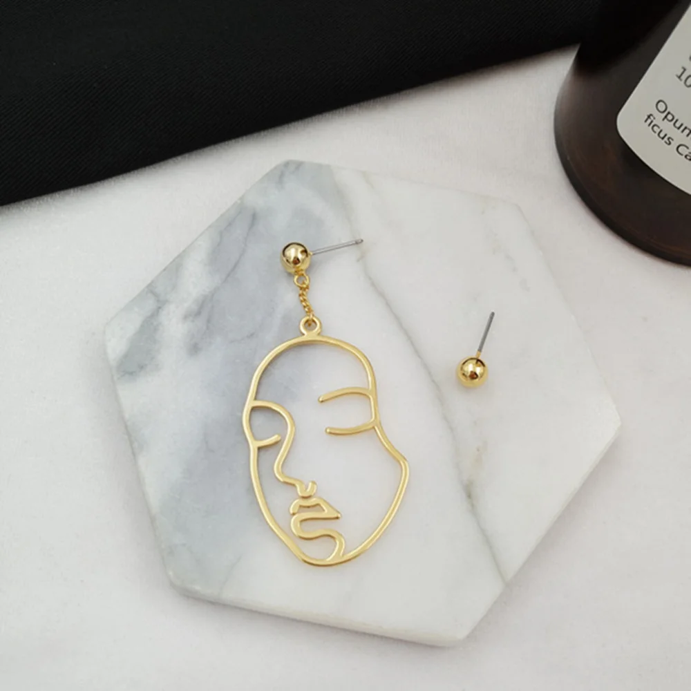 Женские абстрактные асимметричные серьги длинные висячие в форме лица (золотые) |