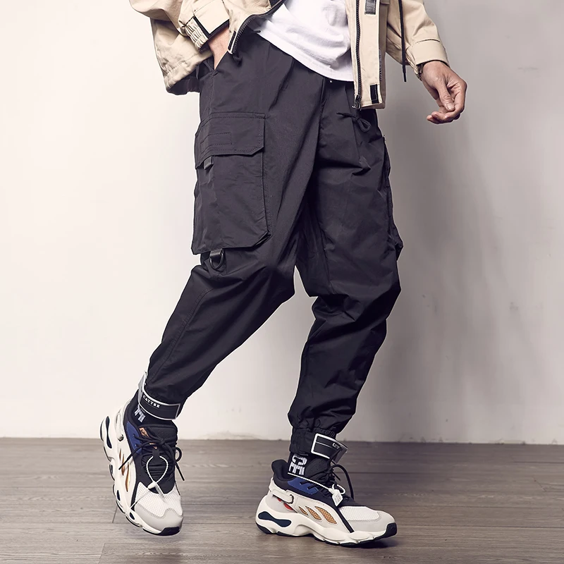 

Мужские брюки-карго с лентами и карманами, черные брюки-султанки с цветными блоками, Джоггеры в стиле Харадзюку, спортивные штаны в стиле хи...