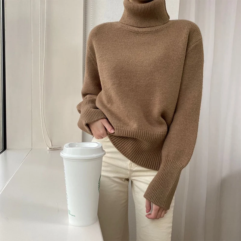 

Женский трикотажный пуловер с высоким воротником и длинным рукавом