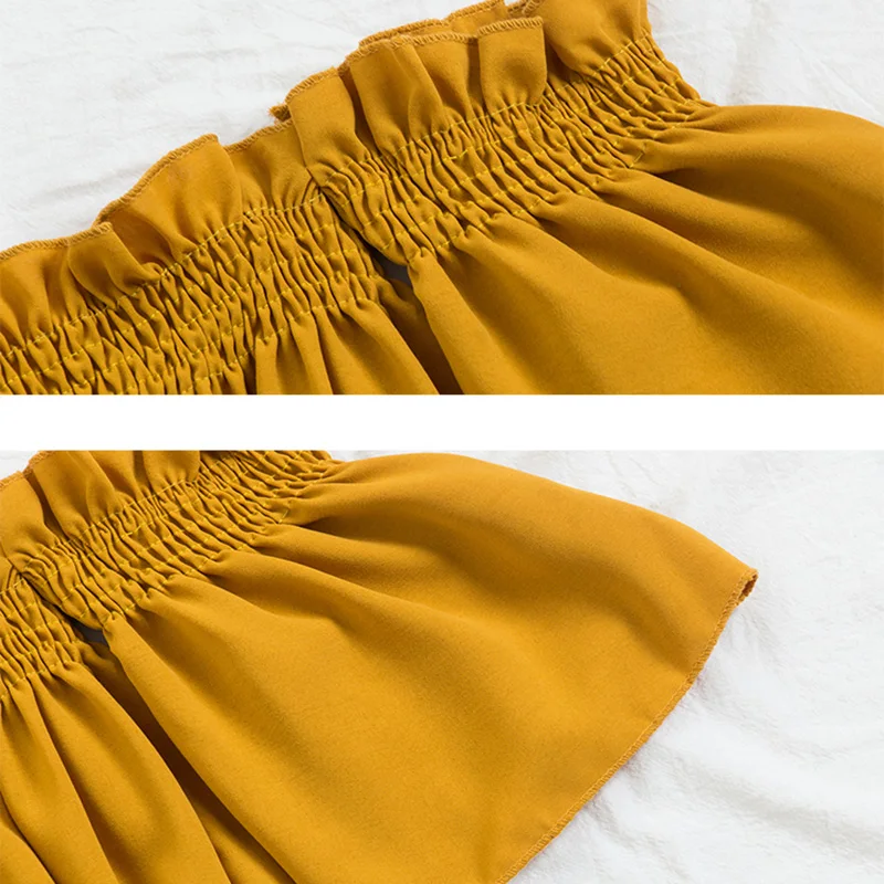 Женский летний костюм из двух предметов топ и брюки |