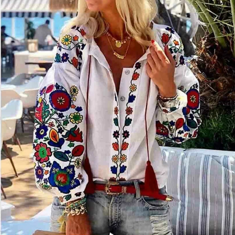 Женская блуза с пышными рукавами v-образным вырезом длинными и цветочным принтом