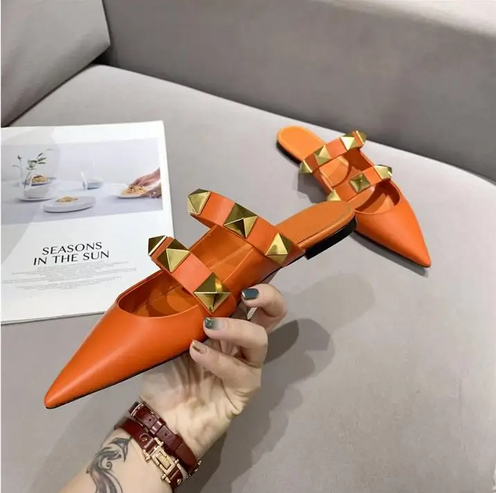 

2021 new spring and summer women pointed flat heel slippers European size 35-40 Roman rivet leather flat mules