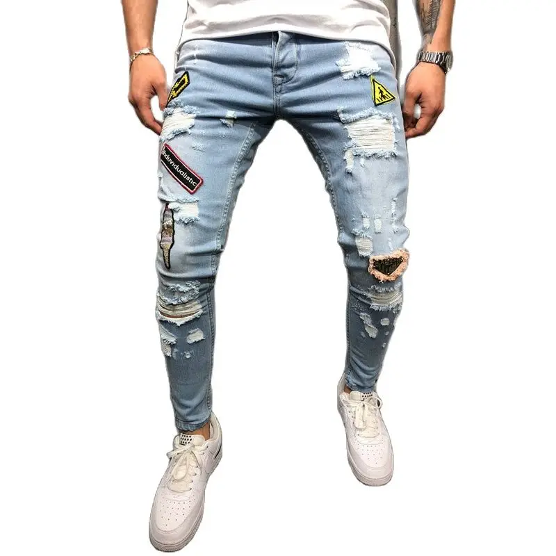 

Fashion Biker Hip Hop Distressed Cowboy Pencil Pants man Ripped Hole Patch Badge Men's Light Blue Jeans Slim Fit Cargo Trousers