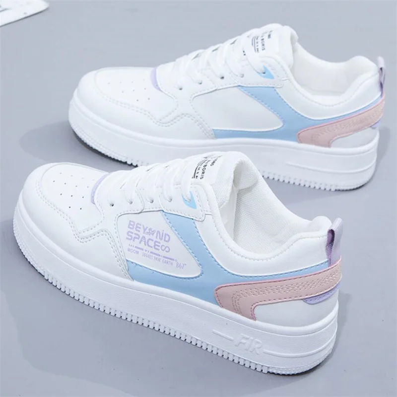 Женские кроссовки из ПУ кожи розовые на плоской вулканизированной подошве