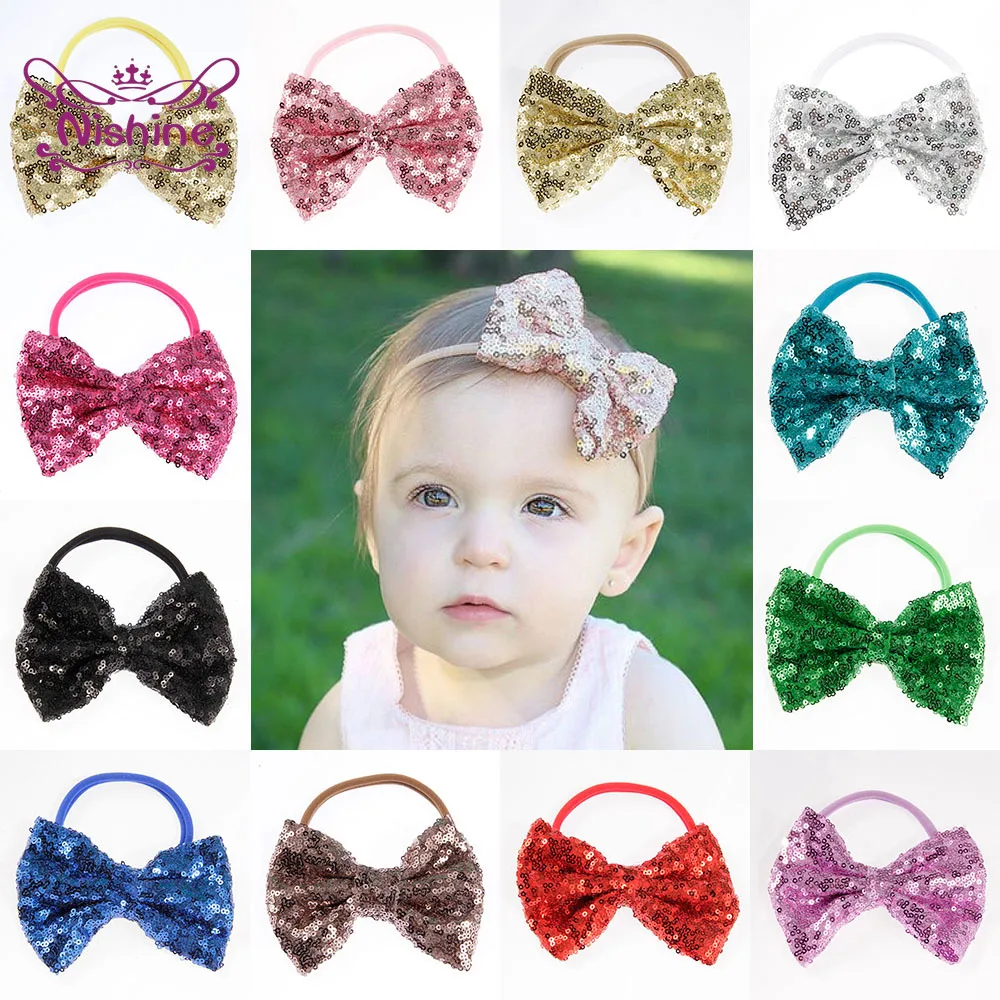 Повязка на голову для девочек нейлоновая однотонная с блестящим бантом большой
