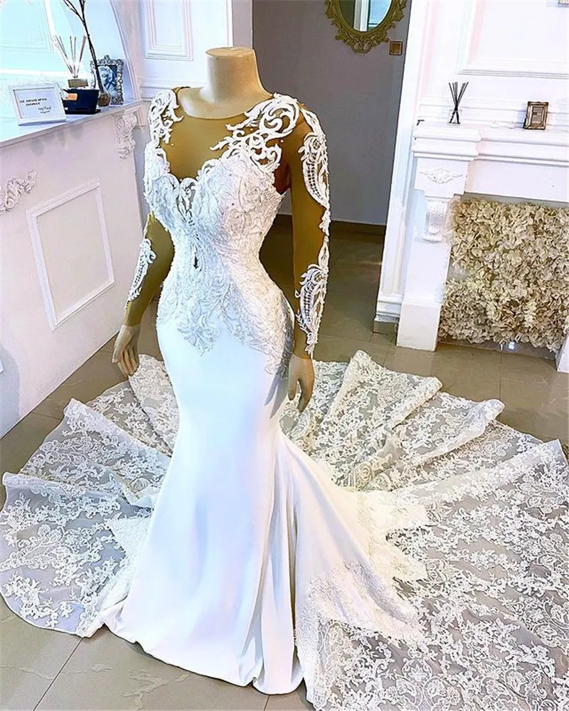 

African Trumpet Wedding Dresses Long Sleeves Sheer Scoop Neck Appliques Lace Up Back Mermaid Bridal Gowns Plus Size Bride Dress