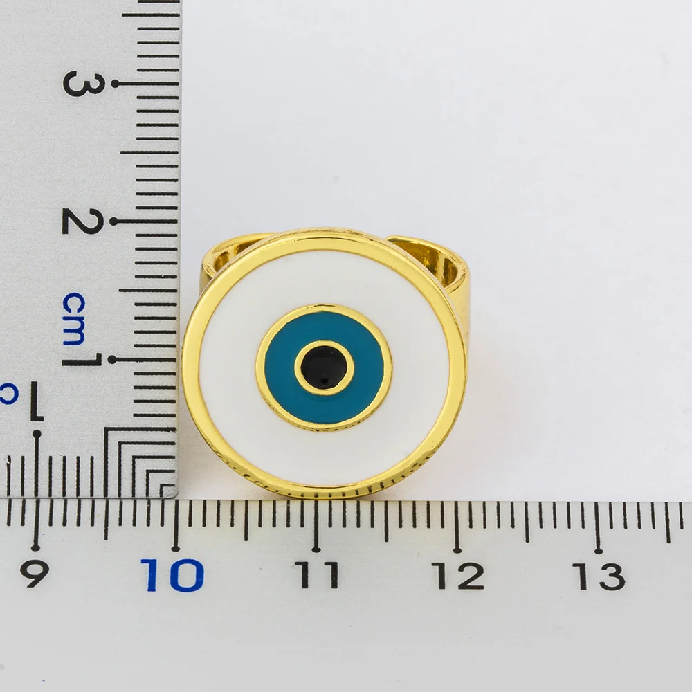 Кольца женские медные золотистые регулируемые с большим синим и белым глазом |