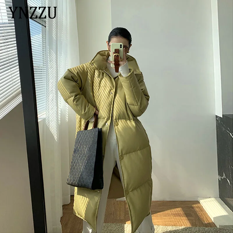 

Роскошный женский зимний кожаный пуховик 2021, модное толстое теплое женское длинное пальто с высоким воротником, однотонное YNZZU 1O264