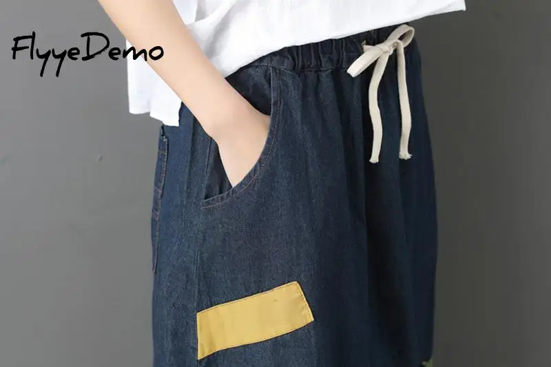 Женская джинсовая юбка до середины икры большого размера с дырками и кисточками