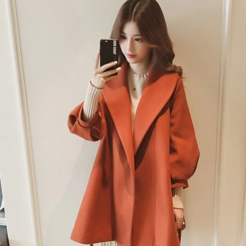 

2019 autumn and winter Korean version of the small thick woolen coat female loose and thin lantern sleeve woolen coat