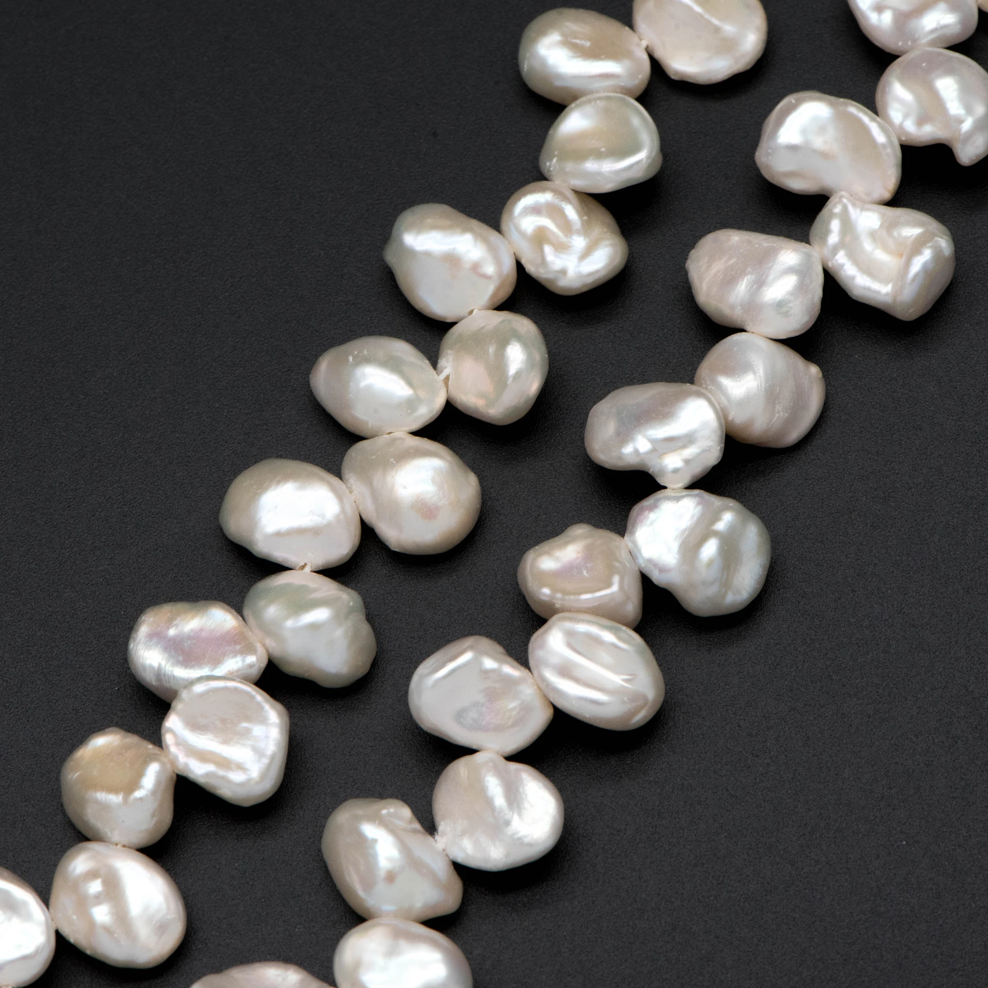 

Petal Freshwater Keshi Pearls 10-11mm, Quality Keishi Drop Wholesale, Side Drilled (PL-67)/ 16" Full Strand