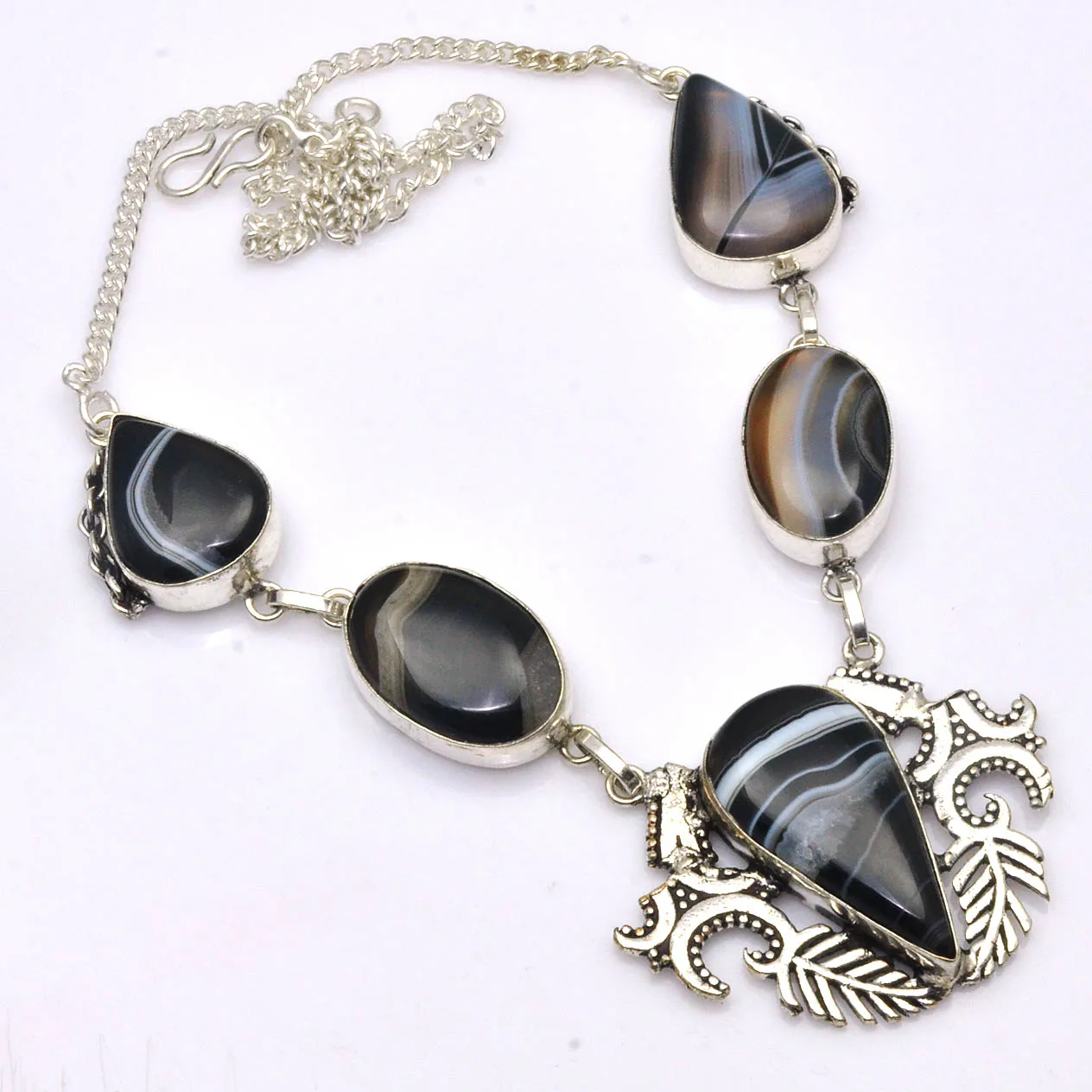 

Genuine Botswana Agate Silver Overlay over Copper, 49 cm , N4589