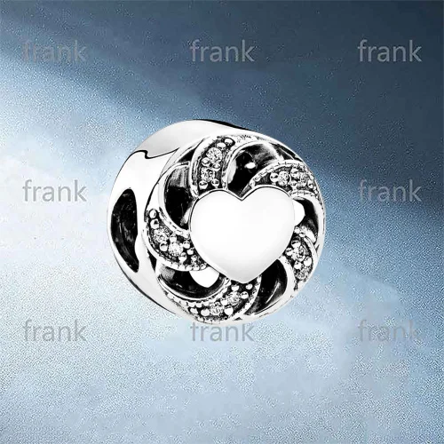 

791976CZ RIBBON HEART CHARM