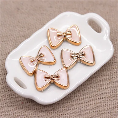 white 50pcs 50 шт. 10*14 мм бант черный/белый/красный эмаль золотой пластик плоская кнопка DIY бижутерия для декорирования/ремесло скрапбук аксессуары - Цвет: white 50pcs